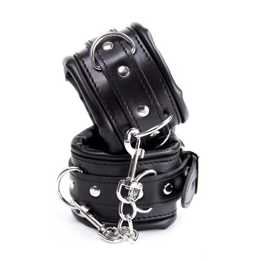 handboeien, leren handboeien, SM accessoires, bondage, BDSM speeltjes, luxe uitvoering, verstelbaar ontwerp, hoogwaardig leer, rollenspellen, bondage-sessies, duurzaam materiaal.